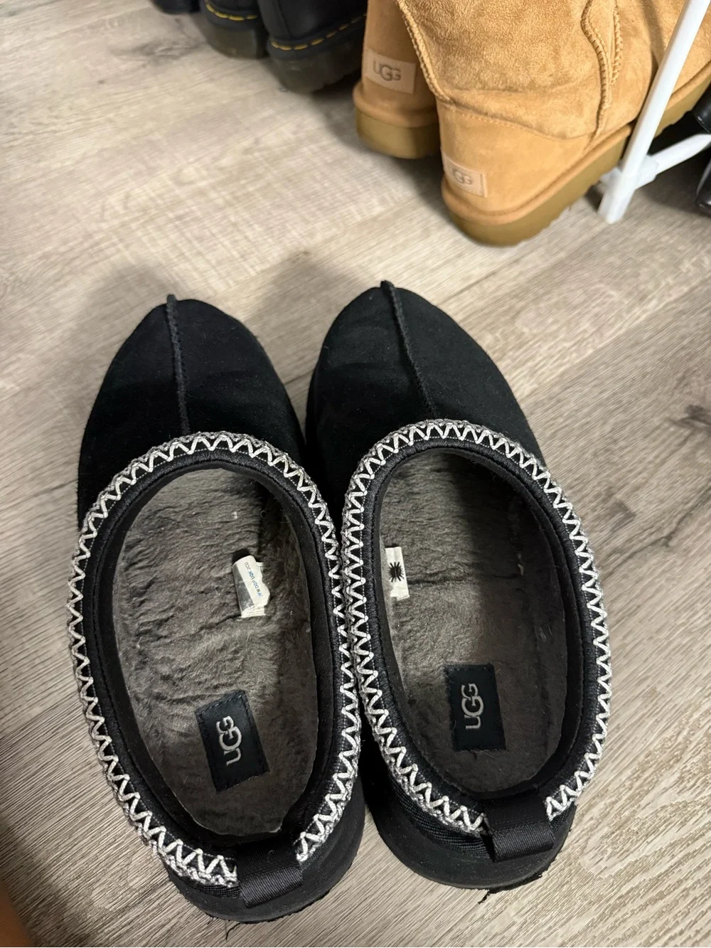 UGG Men’s Black Suede Slip-On Moccasin with Contrast Stitch Trim